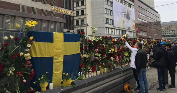 People pay tribute to victims of Stockholm truck attack