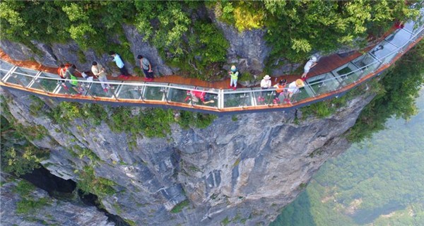 Not for the faint-hearted: Glass bridge opens in Hunan