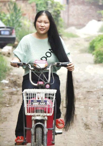 Most of Ji's lustrous locks were measured at more than 1.6 meters, while the longest was 1.73 meters.