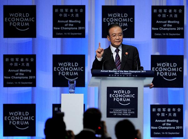 Chinese Premier Wen Jiabao delivers a keynote speech during the opening ceremony of the World Economic Forum Annual Meeting of the New Champions, also known as the Summer Davos Forum, in Dalian, a coastal city in northeast China's Liaoning Province, Sept. 14, 2011. (Xinhua/Li Gang)