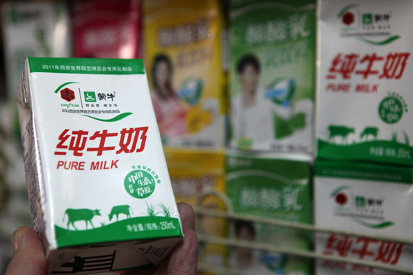 A batch of milk produced by Mengniu Group has tested to have excessive aflatoxin, a cancer-causing substance, over the weekend. Provided to China Daily 