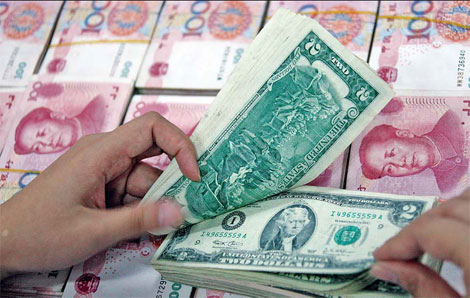 China made six monthly cuts of US debt in 2011, data from the US Treasury Department show, trimming its holdings by $27.5 billion from the end of 2010. (Photo/China Daily)