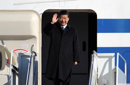 Chinese Vice-President Xi Jinping waves after arriving at Andrews Air Force Base in Washington, February 13, 2012. [Photo/Xinhua]