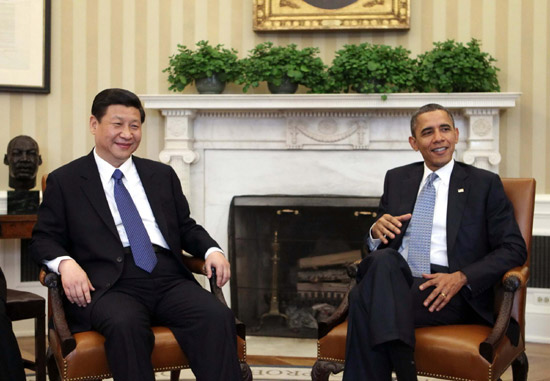 China's Vice-President Xi Jinping (L) meets with US President Barack Obama at the White House in Washington, February 14, 2012. [Photo/Xinhua]