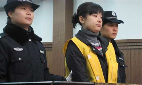 Wu Ying stands trial for financial fraud and is sentenced to death in December 18, 2009.