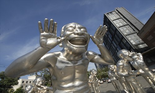 Sculptures by Chinese artist Yue Minjun out the front of the Today Art Museum, Chaoyang district. Photo: CFP