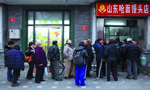 Core, look at those buns - apparently they are worth the wait.  [Photo: Guo Yingguang/GT CFP]