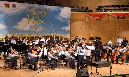 The International Orchestra of YCIS and Yew Wah plays at the Seeds of Hope Fundraising Concert [Photo: Courtesy of YCIS]