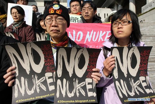 South Korean and Asian civil activists attend a demonstration against the Nuclear Security Summit in Seoul, South Korea, on March 19, 2012. The Nuclear Security Summit is scheduled to be held on March 26 and 27 in South Korea. [Photo: Xinhua/Park Jin hee]
