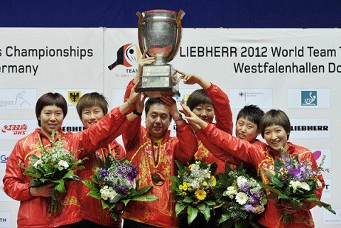 Team China celebrates after winning the women's title at the world team table tennis championships in Dortmund of Germany April 1, 2012. [Photo\Xinhua]