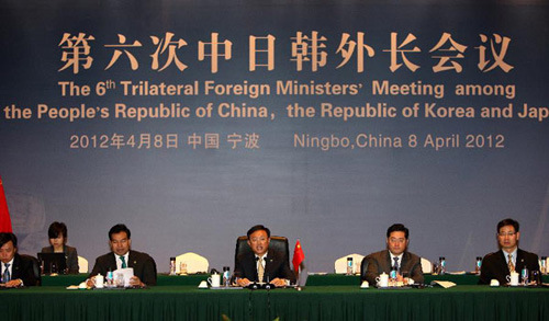 Chinese Foreign Minister Yang Jiechi (C) speaks during the sixth Trilateral Foreign Ministers' Meeting among China, the Republic of Korea (ROK) and Japan, in Ningbo, a port city in east China's Zhejiang Province, April 8, 2012. Yang Jiechi and his Japanes