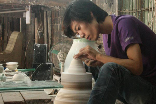 A man makes a cup at a ceramics workshop in Jingdezhen, Jiangxi province. Known as China's Capital of Porcelain, the city is now struggling to recapture its former glory. Wang Hao / China Daily 