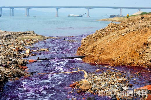 Contaminated water is running into the Xiangjiang River on September 17, 2011.