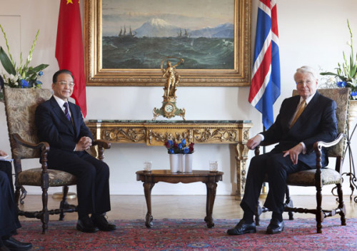 Chinese Premier Wen Jiabao meets with Iceland's President Olafur Ragnar Grimsson at Bessastadir, the presidential residence, in Reykjavik, on Friday. [Thorvaldur Orn Kristmundsson / AFP]