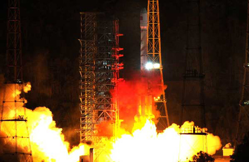 The Long March-3B rocket carrying two satellites blasts off from the launch pad at the Xichang Satellite Launch Center in Xichang, Southwest China's Sichuan Province, on April 30, 2012. (Xinhua/Tao Ming)
