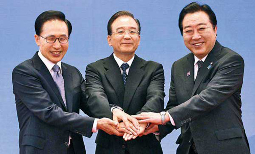 Premier Wen Jiabao, ROK President Lee Myung-bak and Japanese Prime Minister Yoshihiko Noda attend the fifth trilateral meeting in Beijing on Sunday. The three nations reached an agreement that they will not accept further nuclear tests or any provocations from the Democratic Peoples Republic of Korea. Wu Zhiyi / China Daily