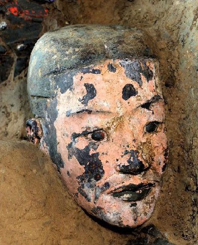Photo taken on June 9, 2012 shows the newly unearthed terracotta warrior which was painted with colors at the No. 1 pit of the Museum of Qin Shihuang Terracotta Warriors and Horses in Xi'an, capital of northwest China's Shaanxi Province. Since the third e