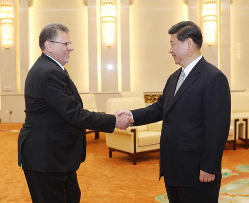 Chinese Vice President Xi Jinping (R) shakes hands with Libyan Foreign Minister Ashour Ben Khayil during a meeting with him in Beijing, capital of China, June 11, 2012. (Xinhua/Liu Weibing)
