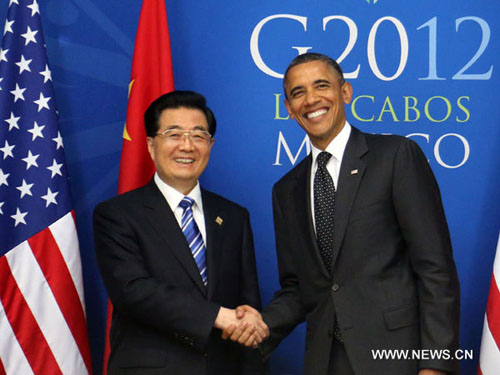 Chinese President Hu Jintao (L) meets with U.S. President Barack Obama in Los Cabos, Mexico, June 19, 2012. (Xinhua/Lan Hongguang)