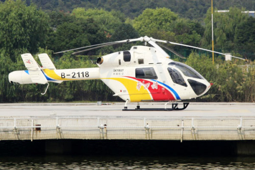 A helicopter sits on the parking apron at the airport of Huaxi village, in Jiangsu province. 