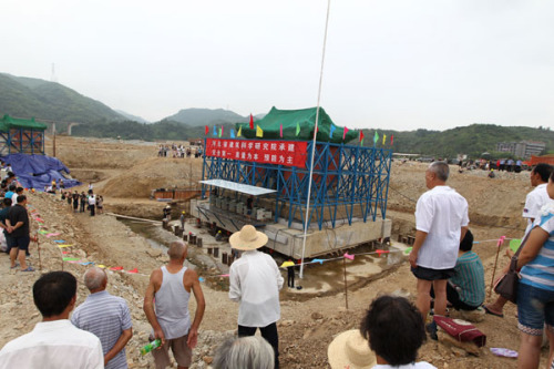 The gate of Yuzhen Palace will be raised 15 meters to avoid being inundated. Zhang Jianbo / for China Daily