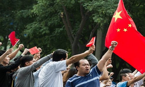 Protesters gather in front of the Japanese embassy in Beijing on Tuesday. Photo: Li Hao/GT 