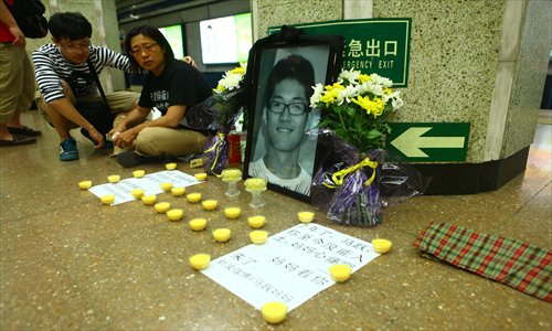 Meng mourns her son on August 23, 2012, two years after he died at Gulou Subway Station. Photo: Guo Yingguang/GT 