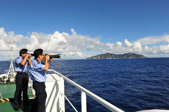 China's surveillance ship Haijian 50 arrives at waters around the Diaoyu Islands, Sept. 14, 2012. Two Chinese surveillance ship fleets have arrived at waters around the Diaoyu Islands and its affiliated islets Friday morning and started patrol and law enforcement there. It is the first time for Chinese surveillance ships to patrol there after the Chinese government announced on Monday the base points and baselines of the territorial waters of the Diaoyu Islands and their affiliated islets, as well as the names and coordinates of 17 base points. These law enforcement and patrol activities are aimed to demonstrate China's jurisdiction over the Diaoyu Islands and its affiliated islets and ensure the country's maritime interests, according to a government statement. (Photo: Xinhua)