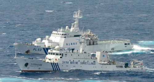 Marine surveillance ship Haijian 66 (front) patrols next to a Japan Coast Guard vessel on Monday near Chinas Diaoyu Islands. REUTERS / Kyodo