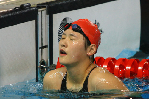Ye Shiwen of Zhejiang reacts after competing in the women's 50m freestyle finals at the Chinese national swimming championships in Huangshan, Anhui province, Sept 25, 2012. [Photo/Xinhua]