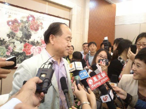 Mo Yan, after winning the 2012 Nobel Prize in Literature, is interviewed by the press in his hometown Gaomi, east China's Shandong Province, Oct. 11, 2012. Chinese writer Mo Yan has won the 2012 Nobel Prize in Literature, the Swedish Academy announced in Stockholm on Thursday. (Xinhua/Zhao Xiaoyu)