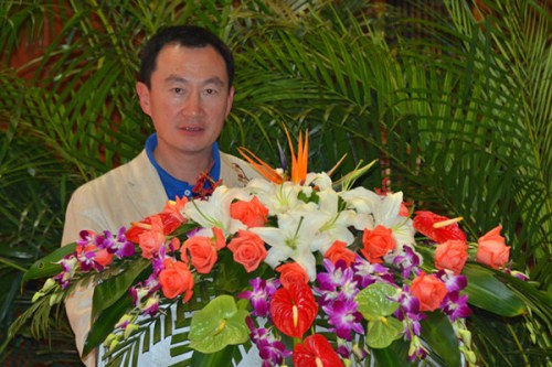 China's very first Olympic equestrian athlete Huang Zuping, 49, speaks during the first Equestrian Seminar of the Wenjiang China Equestrian Festival, Sichuan Province, Oct. 14, 2012. [China.org.cn]