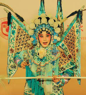 The release ceremony of 100 Peking Opera Classics in Beijing also features a performance of the genre. Liang Yue / for China Daily