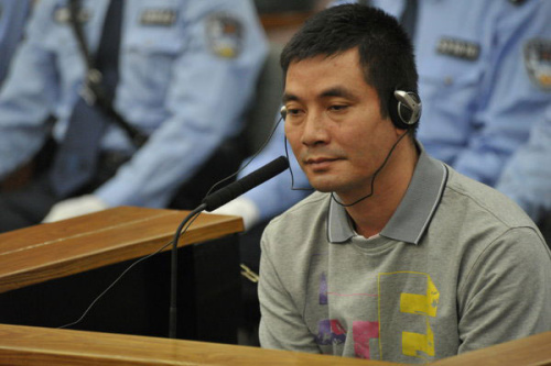 Naw Kham, principal suspect for the murders of 13 Chinese sailors on the Mekong River last year, appears at the Intermediate People's Court of Kunming, capital of Yunnan province, on Sept 20, 2012. [Photo/Xinhua]
