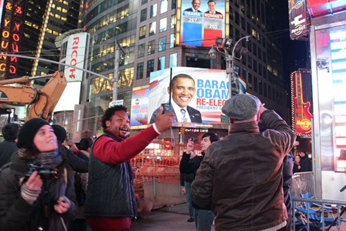 Obama supporters are celebrating cheerfully in Times Square, New York as Barack Obama has been re-elected. Yu Wei / China Daily  