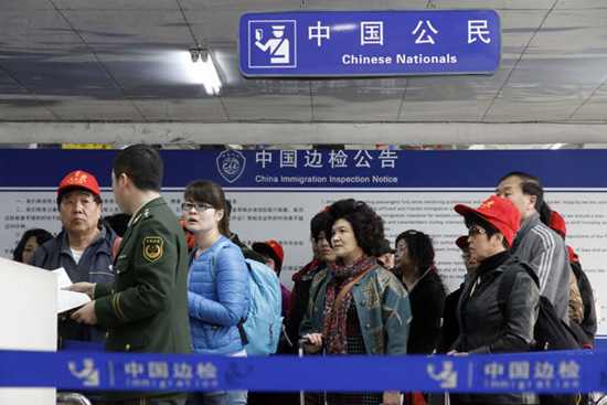 Chinese have become some of the most sought-after tourists because of their spending power. Statistics suggest they will take 80 million overseas trips in 2012. [Photo by Chen Hao / for China Daily]