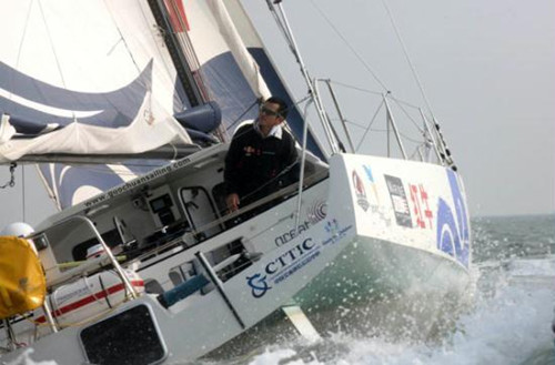 Chinese sailor Guo Chuan starts his around-the-globe sail off the Qingdao coast, East  China's Shandong province, Nov 18, 2012. [Photo/Xinhua]