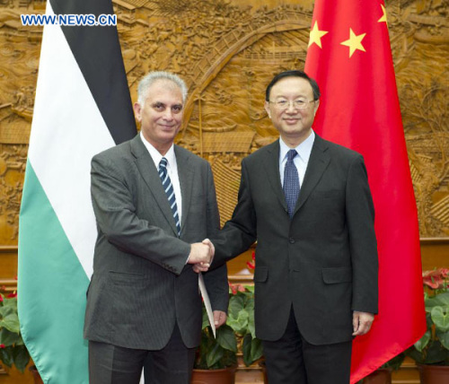 Chinese Foreign Minister Yang Jiechi (R) holds talks with Bassam al-Salhi, an envoy of Palestinian President Mahmoud Abbas and also general secretary of the Palestinian People's Party, in Beijing, capital of China, Nov. 23, 2012. (Xinhua/Huang Jingwen)