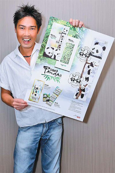 Under Edmund Chen's colored pencils, the pandas come alive on the commemorative stamps. Photos by Sam Yeo / for China Daily