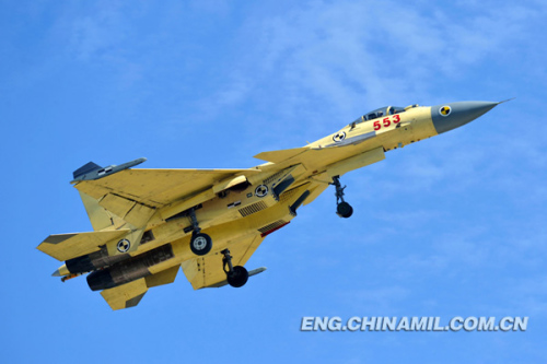 Recently, China's independently-developed carrier-borne J-15 fighters conducted test flights on such subjects as the landing with arresting cable and the ski-jump takeoff on the Liaoning aircraft carrier. As a China's independently-developed carrier-borne multi-purpose-type fighter, the J-15 fighter can carry various types of precision-guided weapons with long-range attack and round-the-clock fighting capacities. (chinamil.com.cn/ Pu Haiyang)