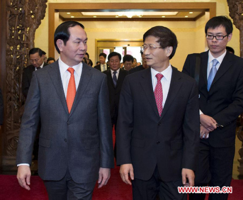 Chinese State Councilor Meng Jianzhu (R, front), also a member of the Political Bureau of the Communist Party of China (CPC) Central Committee and China's public security minister, meets with Vietnamese Minister of Public Security Tran Dai Quang (L, front) in Beijing, capital of China, Dec. 10, 2012.(Xinhua/Wang Ye) 