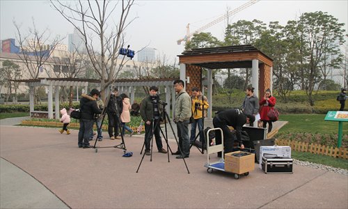 Sun Xudong's microfilm crew works on the environmentally-themed Gift of Love. Photo: Courtesy of Sun Xudong 