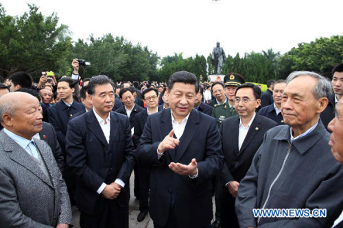 Photo released on Dec. 11, 2012 shows Xi Jinping (3rd L, front), general secretary of the Communist Party of China (CPC) Central Committee and chairman of the CPC Central Military Commission (CMC), talks with retired comrades who participated in the construction of Shenzhen Special Economic Zone in Shenzhen Lianhuashan Park in Shenzhen, south China's Guangdong Province. Xi made an inspection tour in Guangdong from Dec. 7 to 11. (Xinhua/Lan Hongguang)
