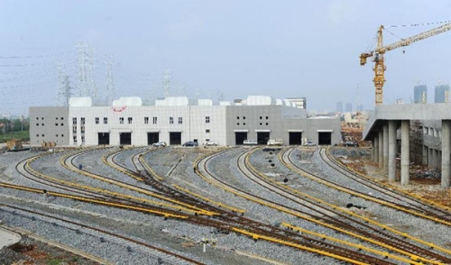 Photo taken on July 14, 2012 shows the Changqing depot of Wuhan Subway Line 2 in Wuhan, capital of central China's Hubei Province. The Line No 2 is the first subway line of the city, also the first subway line across the Yangtze River. [Photo/Xinhua]