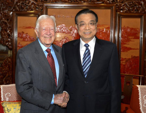 Chinese Vice Premier Li Keqiang (R) meets with former U.S. President Jimmy Carter in Beijing, capital of China, Dec. 11, 2012. (Xinhua/Xie Huanchi)