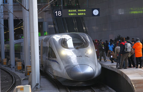 A high-speed train for the Beijing-Guangzhou route is set for test operation in Beijing on Saturday. Opening of the line will not only benefit towns and cities along its route but also release huge cargo transport capacity. ZOU HONG / CHINA DAILY