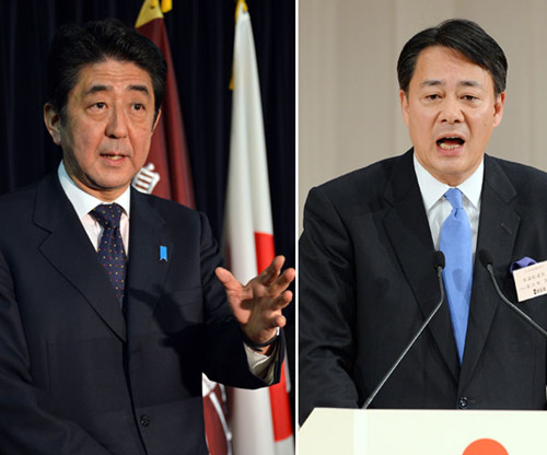 Shinzo Abe (left), Japan's incoming Prime Minister and leader of Liberal Democratic Party, speaks to the media as he names new LDP party executives at their headquarters in Tokyo on Tuesday. Former Japanese economics minister Banri Kaieda (right) speaks a
