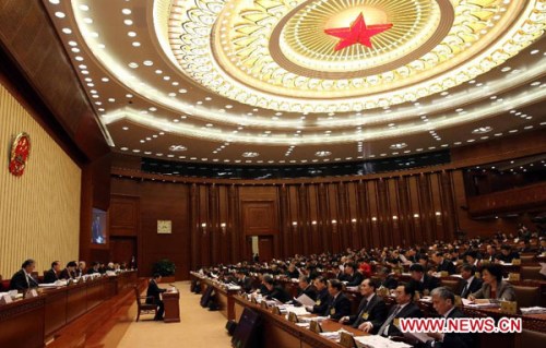 The third plenary meeting of the 30th session of the 11th National People's Congress (NPC) Standing Committee is held at the Great Hall of the People in Beijing, capital of China, Dec. 26, 2012. Wu Bangguo, chairman of the NPC Standing Committee, attended the meeting. (Xinhua/Fan Rujun)