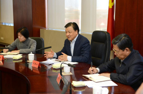 Liu Yunshan (C), a member of the Standing Committee of the Communist Party of China (CPC) Central Committee and member of the Secretariat of the CPC Central Committee, presides over a seminar on the education and implementation of the CPC's principle of a