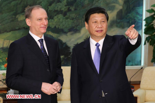 Xi Jinping (R), general secretary of the Communist Party of China Central Committee, meets with Russian Security Council Secretary Nikolai Patrushev in Beijing, capital of China, Jan. 8, 2013. (Xinhua/Lan Hongguang)